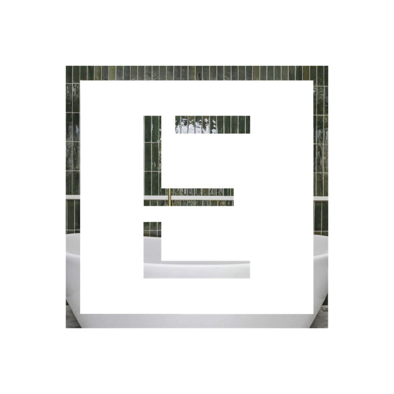 Estate Renovations E monogram set against emerald glazed tile
